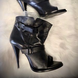 Givenchy slouch bootie stiletto shoe with strap.